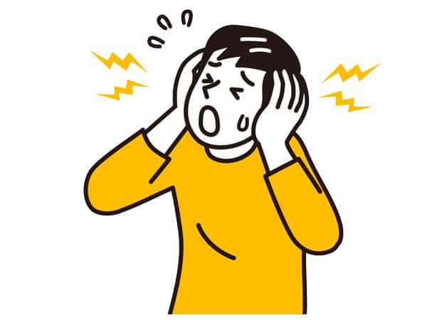 騒音に悩まされる人のイメージ